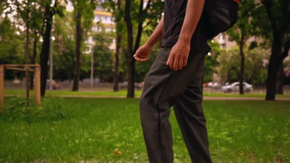 Panorama From Feet To Face Man Walks in Town