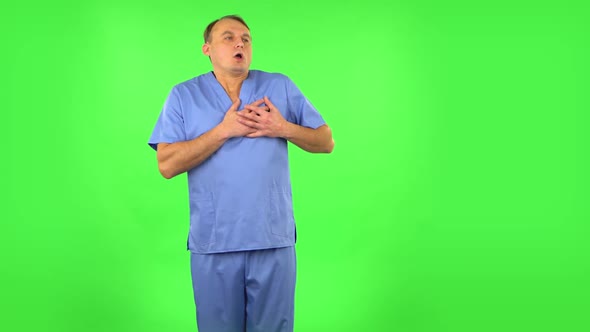Medical Man Is Very Frightened, Then Sighs in Relief. Green Screen
