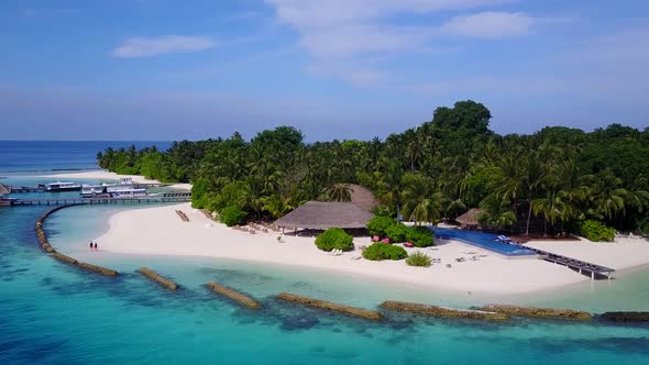 Drone panorama of bay beach by blue ocean with sand background