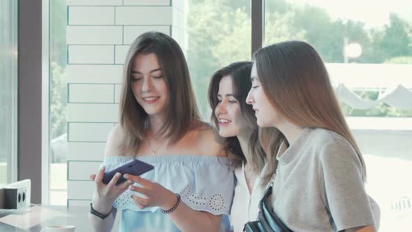 Happy Female Friends Taking Selfies at Brunch at the Coffee Shop