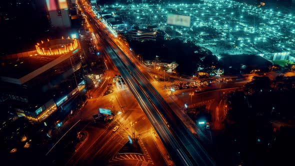 Time Lapse of Busy Highway Road Junction in Metropolis City Center at Night