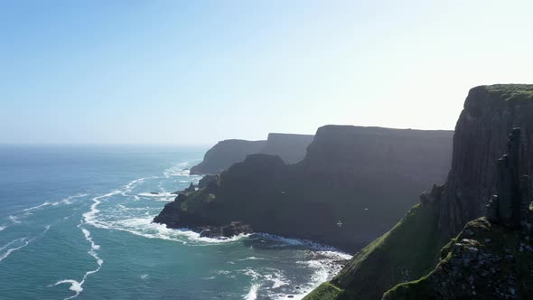 The Giants Causeway lies at the foot of the basalt cliffs along the sea coast on the north shores of