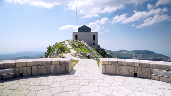 Scenic view of the Njegos mausoleum in Montenegro on the mount Lovcen from a round stone terrace wit