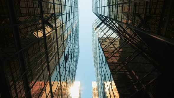 Looking up to High-rise Business Buildings Skyscrapers Futuristic Architecture 