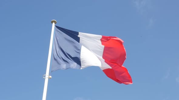 Slow motion of French flag fabric waving in front of blue sky 1920X1080 FullHD footage - Tricolor fl