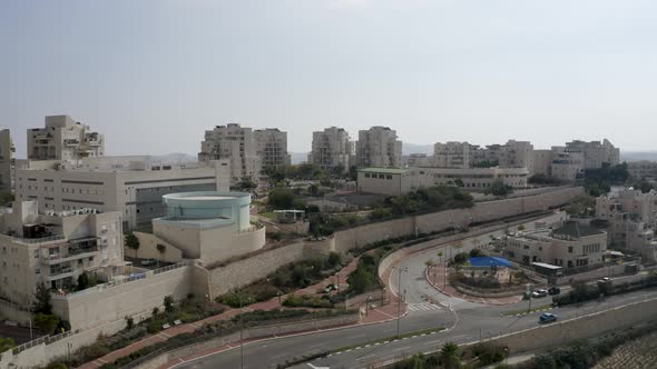 Israel, Modi'in city fly over, desert mountain background view, drone shot