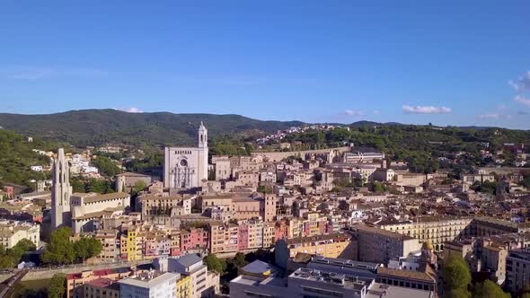 Aerial shot of Girona city in Spain with picturesque colorful houses.