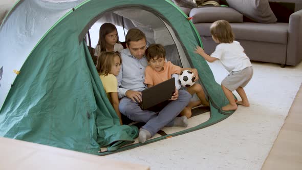 Dad and Children Playing Camping at Home