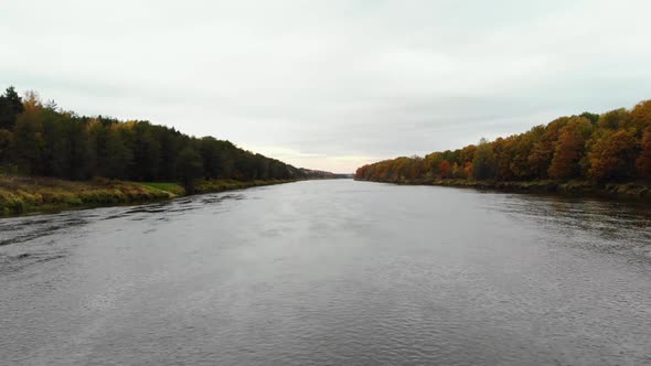 Aerial View. Flying Over the River. Beautiful Autumn Day