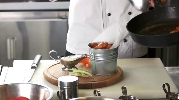 Chef Preparing Chicken Wings