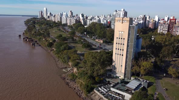 lower drone flight at the parana river near the city of Rosario in Argentina where the tall building