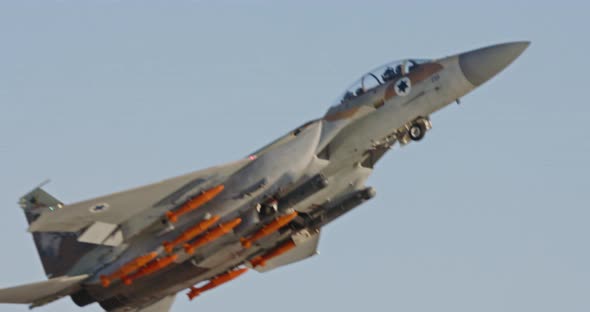 F-15 attack fighter taking off for a bombing run during an airshow