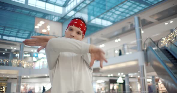 Professional Dancer Performing Modern Dance in Shopping Center