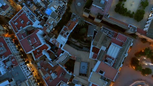 Rooftops and Streets of Seville at Night