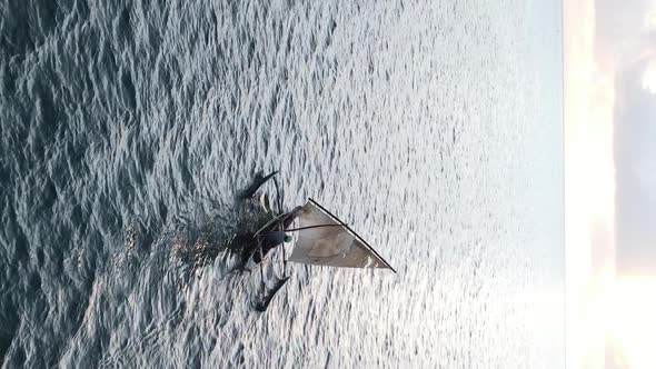 Vertical Video Boats in the Ocean Near the Coast of Zanzibar Tanzania Aerial View