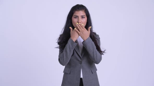 Young Beautiful Persian Businesswoman Showing Speak No Evil Concept