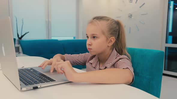 Little Girl and Laptop
