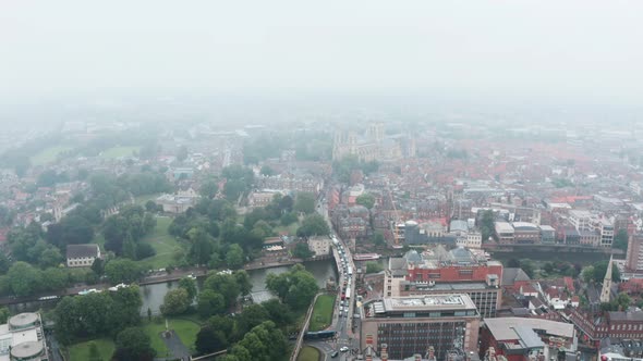 Drone shot through the clouds to York Minster Cathedral