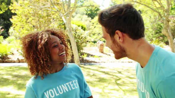 Volunteers having fun in park