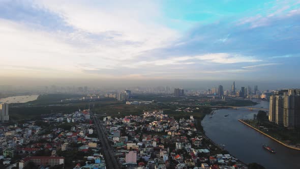 Panoramic cityscape of Ho Chi Minh City, District 1. Aerial urban sunrise.