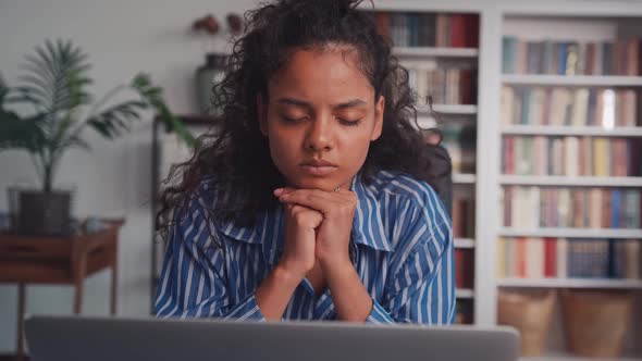 Pensive Young Indian Woman with Laptop Thinking of Creative Ideas at Home Office