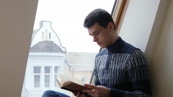 Student Reading Brown Book