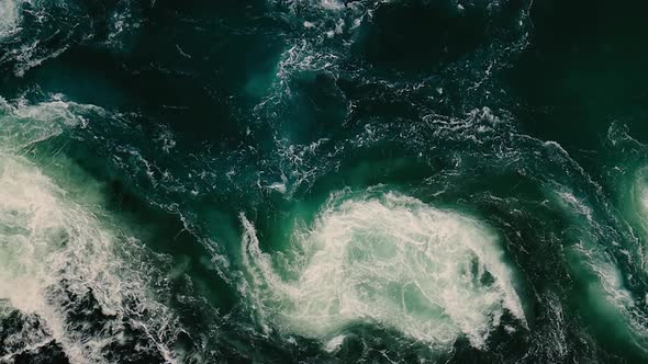 Waves of water of the river and the sea meet each other during high tide and low tide