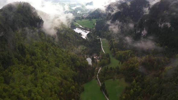 Flying over misty mountains and hills