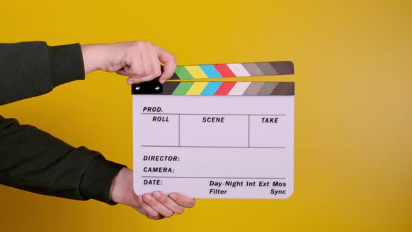 Male Hands Using Clapperboard Against Black Background Shooting Movies