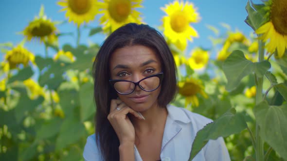 Lovely Woman Agronomist Posing in Cultivated Field