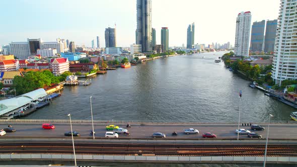 4K UHD : Bangkok River drone view. Flying over the Chao Phraya River