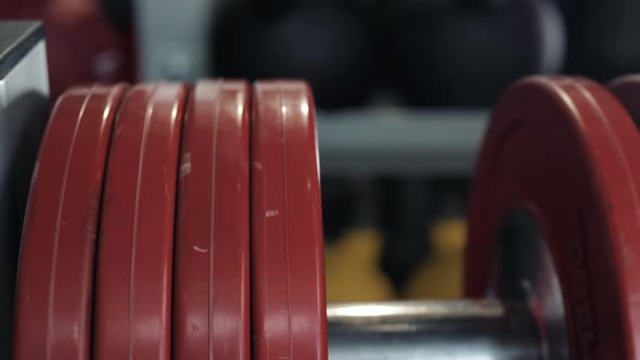 Closeup Macro Close Up of Handsome Bodybuilder Guy Prepare to Do Exercises with Barbell in a Gym