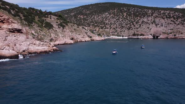 Aerial View of the Bay of the Aegean Sea with Several Boats