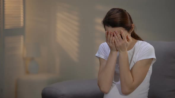 Lonely Abandoned Pregnant Female Throwing Photo From Table, Betrayal and Divorce