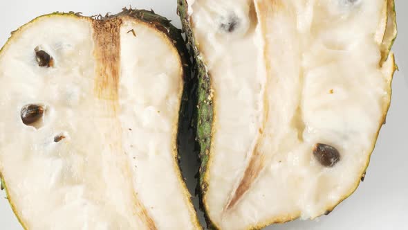 Closeup of Green Soursop Graviola, Exotic, Tropical Fruit Guanabana on Plate