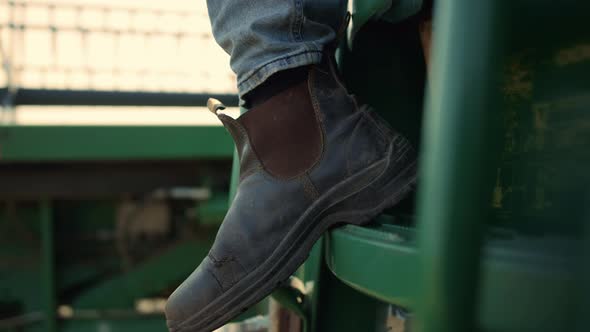 Closeup Driver Leg Tractor at Countryside