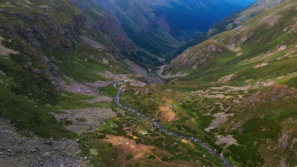 Large tent camp of climbers high in the mountains