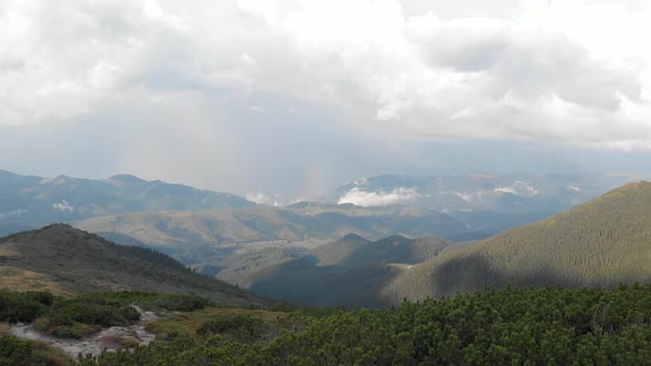 Aerial View of Mountains Peaks Valleys and Forests