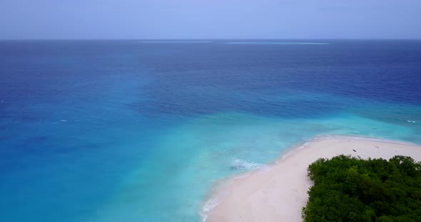 Beautiful aerial abstract shot of a sunshine white sandy paradise beach and blue ocean background