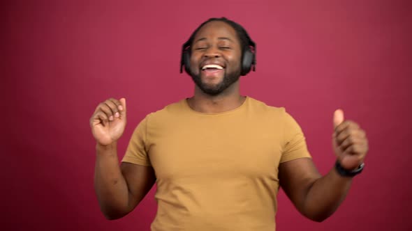 African American Enjoying Listening to Favorite Music