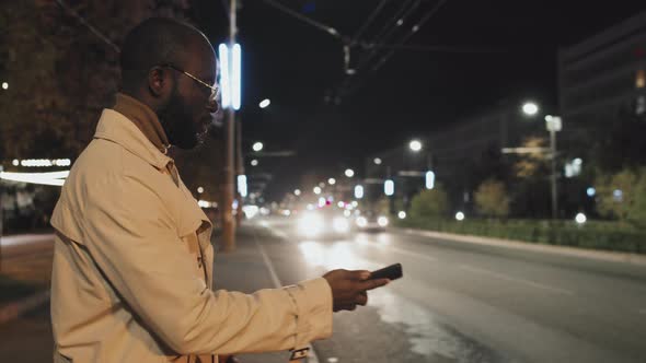 Black Man Catching Taxi