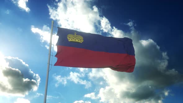 Flag of Liechtenstein Waving at Wind Against Beautiful Blue Sky