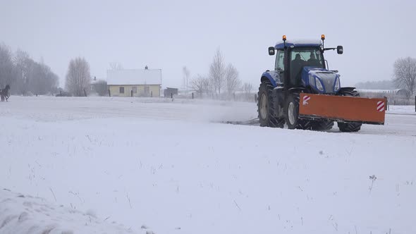 Excavator Bulldozer Clean Snowy Horse Racetrack in Stadium