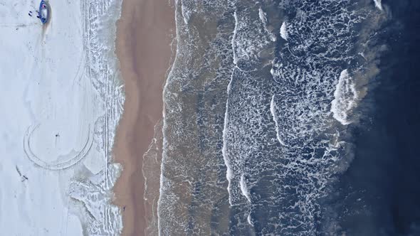 Fishing boats at Baltic Sea in winter.