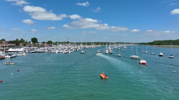 Yachts, Speedboats and Vessels on a River in the Summer