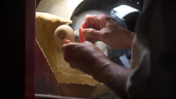 Dental Technician working on dentures