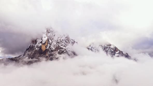 Amazing Aerial Footage of Massive Mountains at Foggy Day.