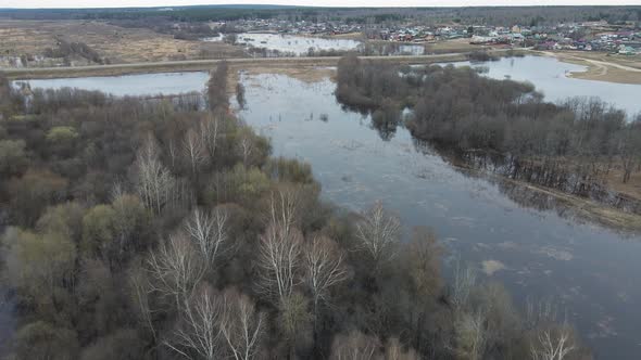 Spring Flood Panorama of Flooded Fields a Village in the Distance Aerial View