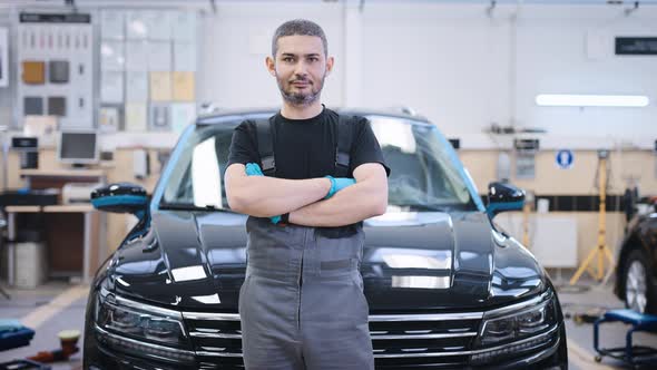 Male Portrait of a Skilled Worker From a Car Service