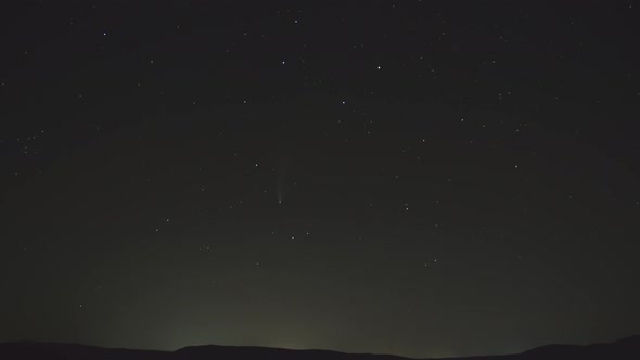 Time Lapse Starry Night Sky with Bright Comet and Meteors